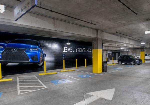 A parking structure well lit with LED parking garage lights